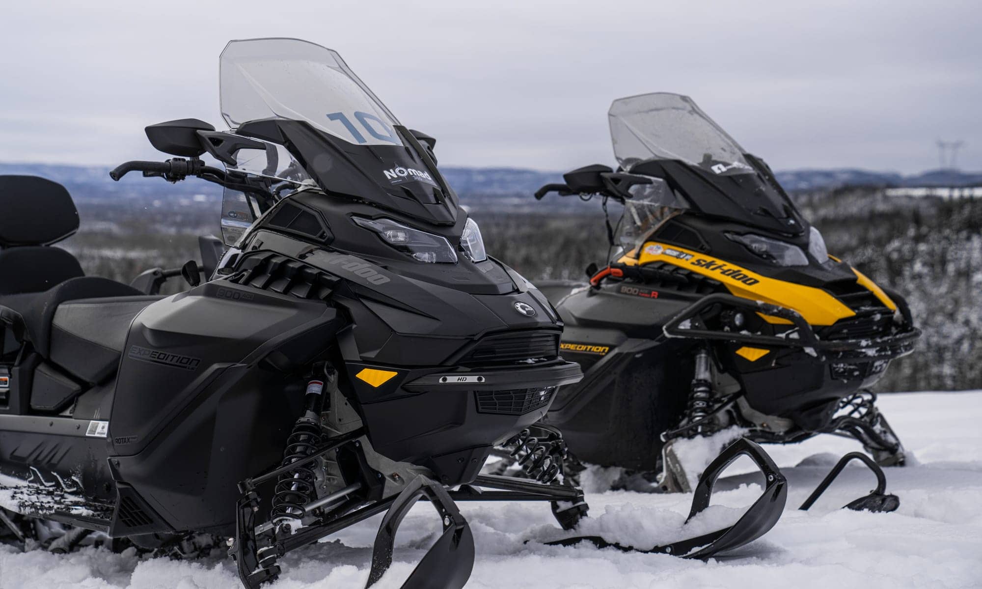 Nomad360's Ski-Doo Expedition sleds facing the view